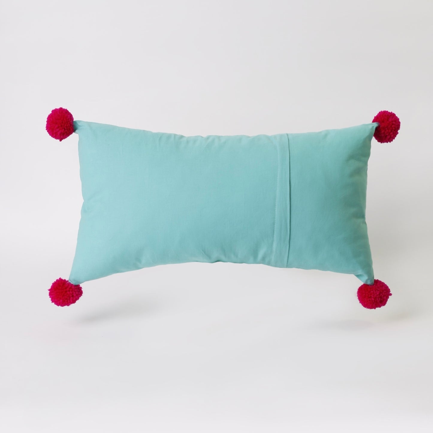 Turquoise hand embroidered cushion