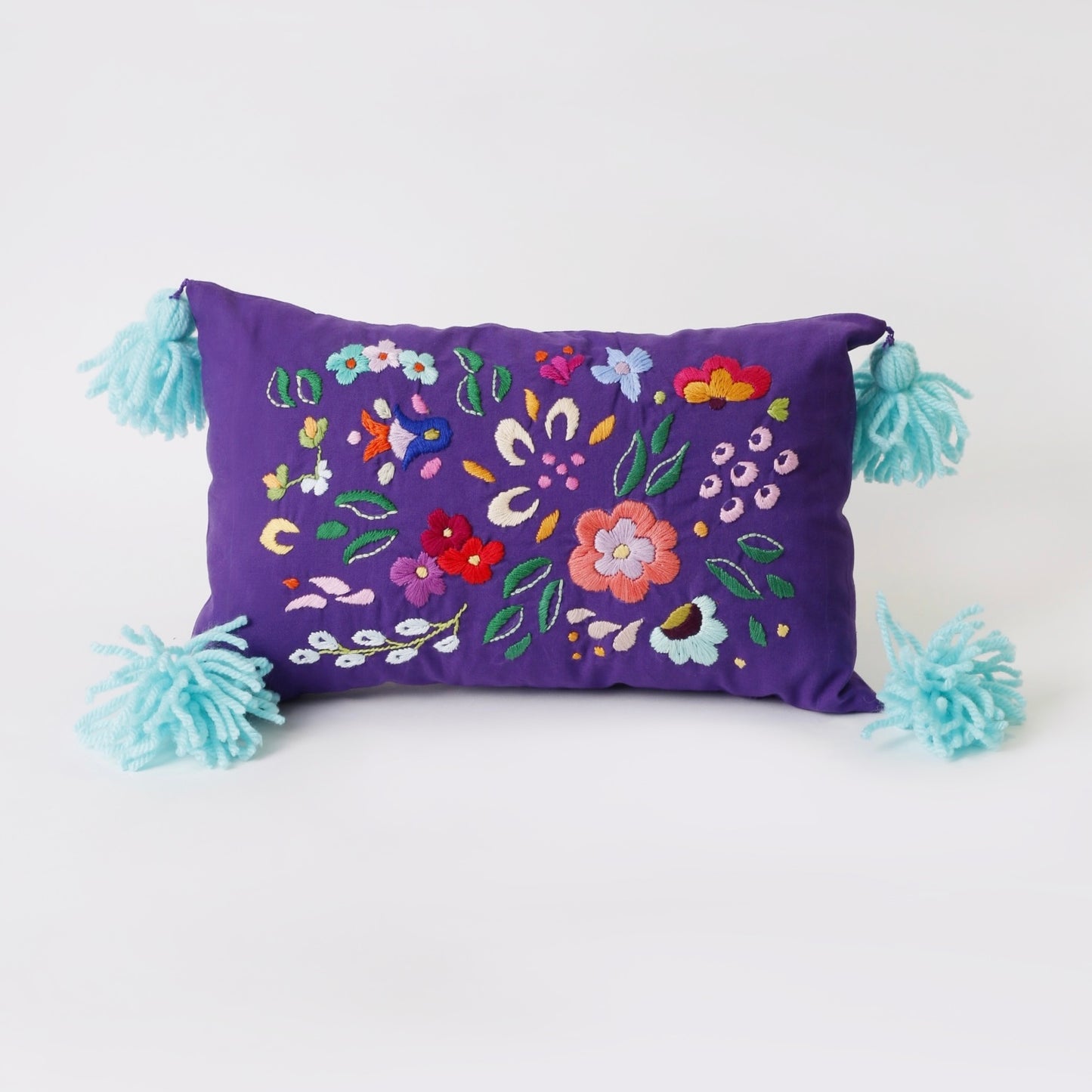 Violet hand embroidered cushion