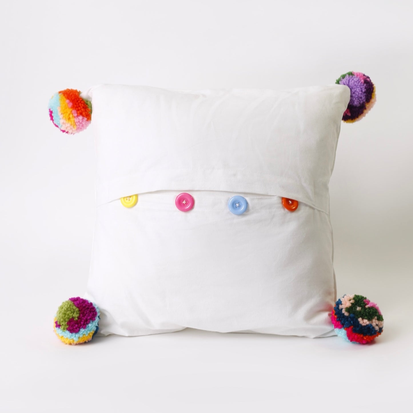 White Embroidered rectangle cotton cushion with pompons