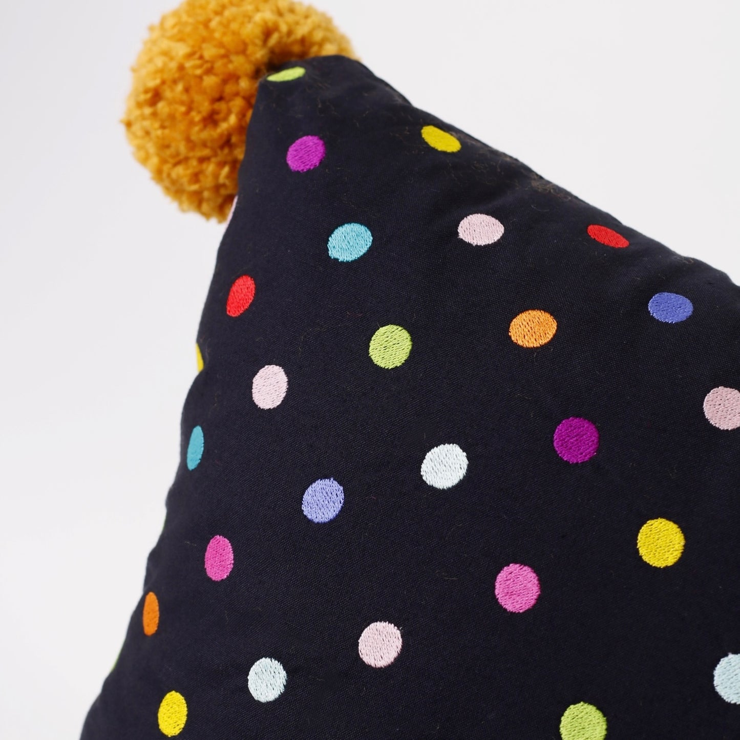 Black Embroidered rectangle cotton cushion with pompons