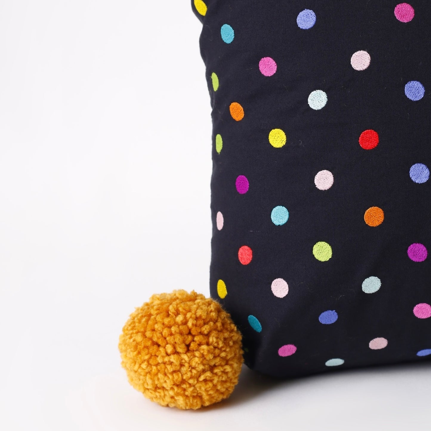Black Embroidered rectangle cotton cushion with pompons