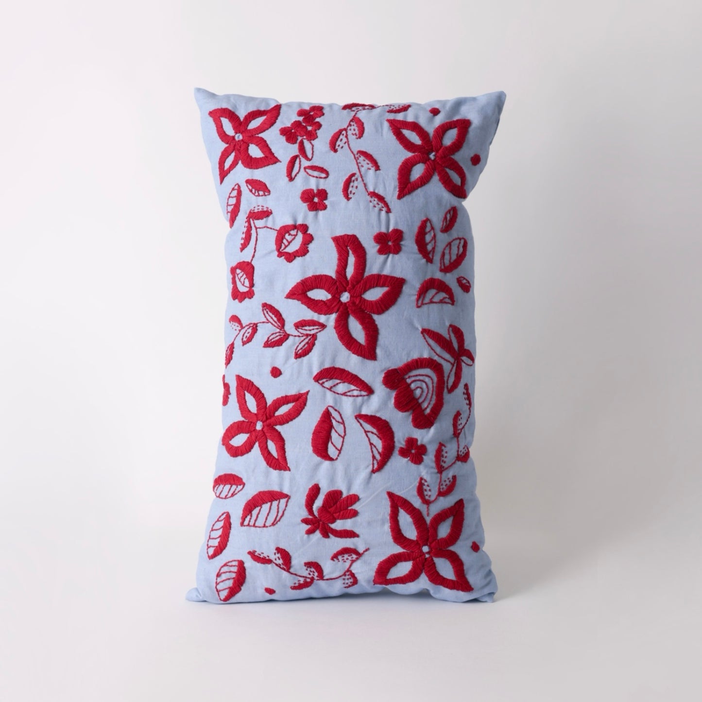 Light blue hand embroidered cushion