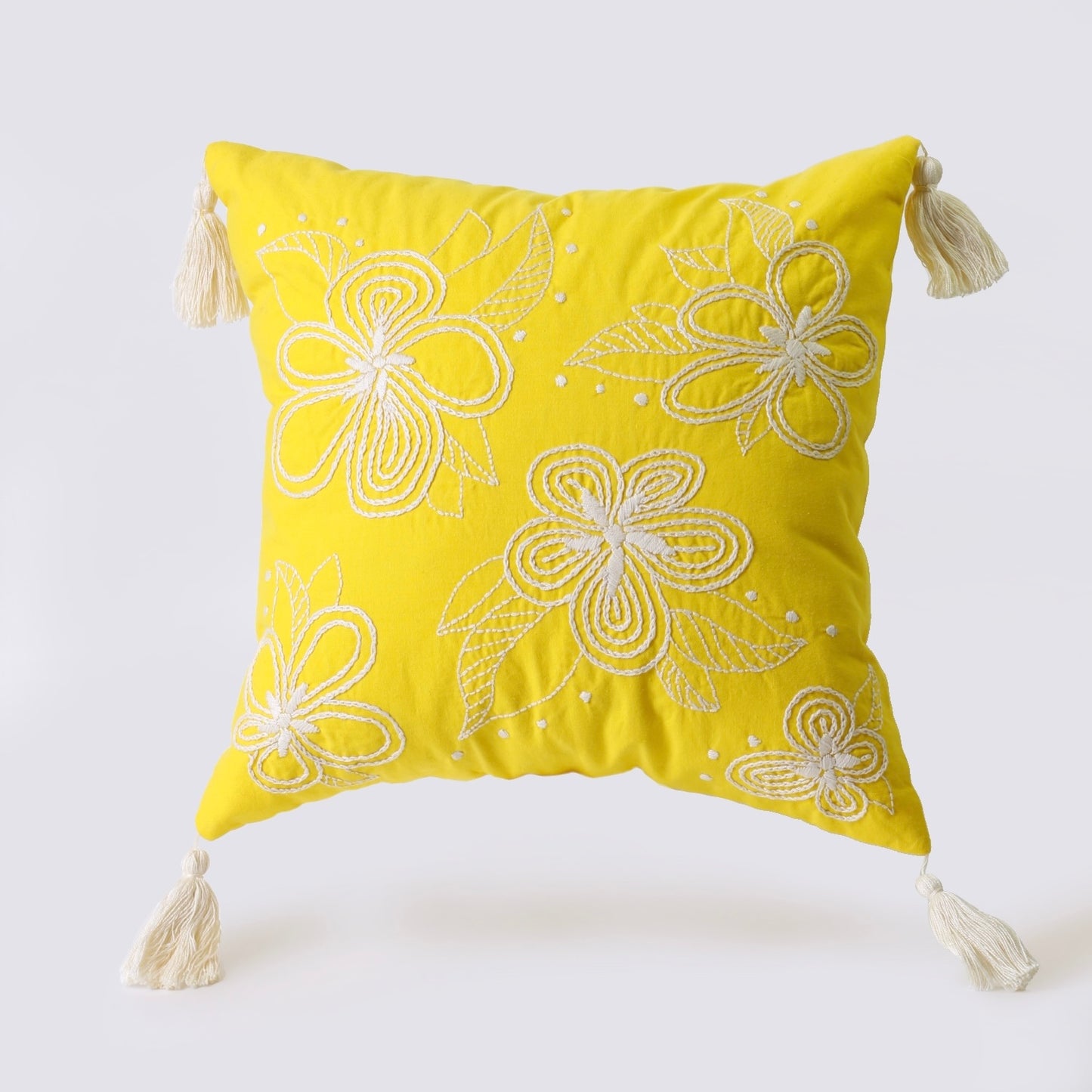 Yellow hand embroidered cushion