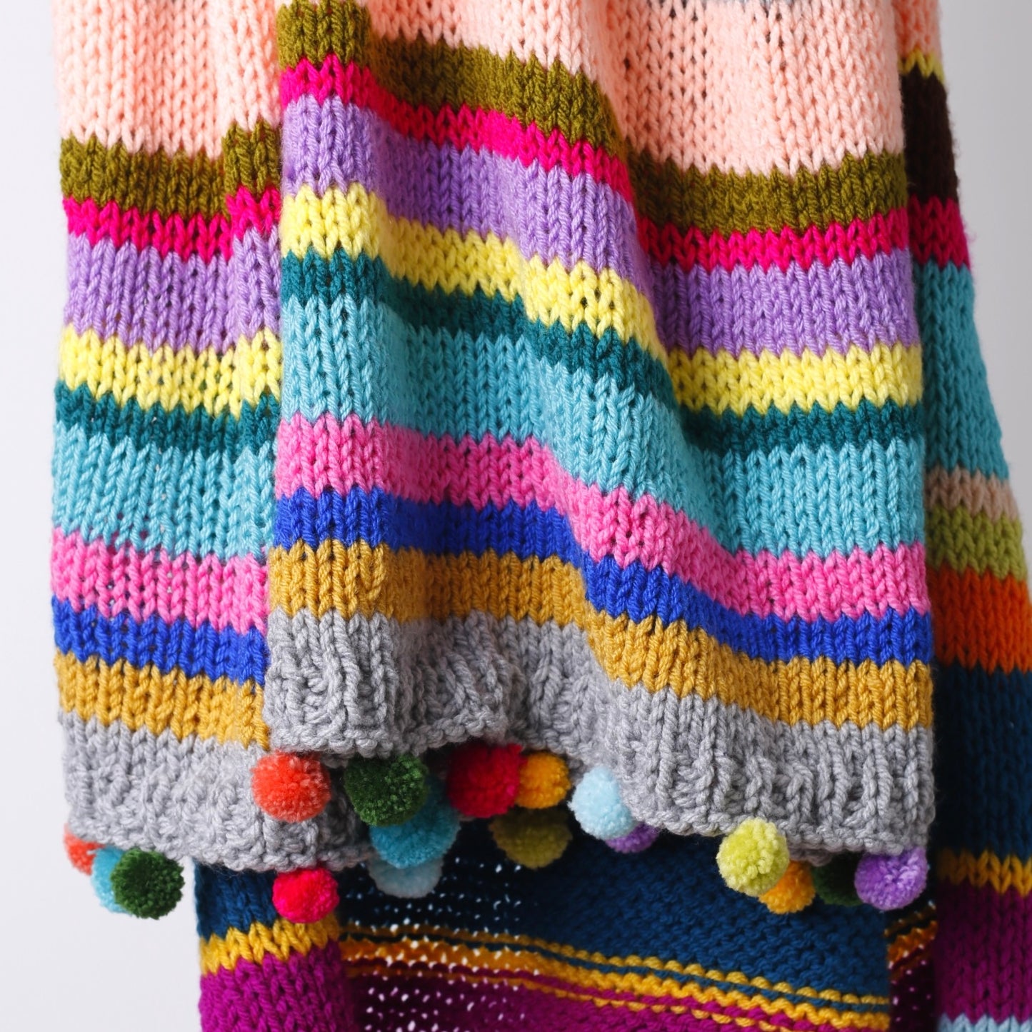 Multicoloured Stripe Knitted Blanket with Pom Poms