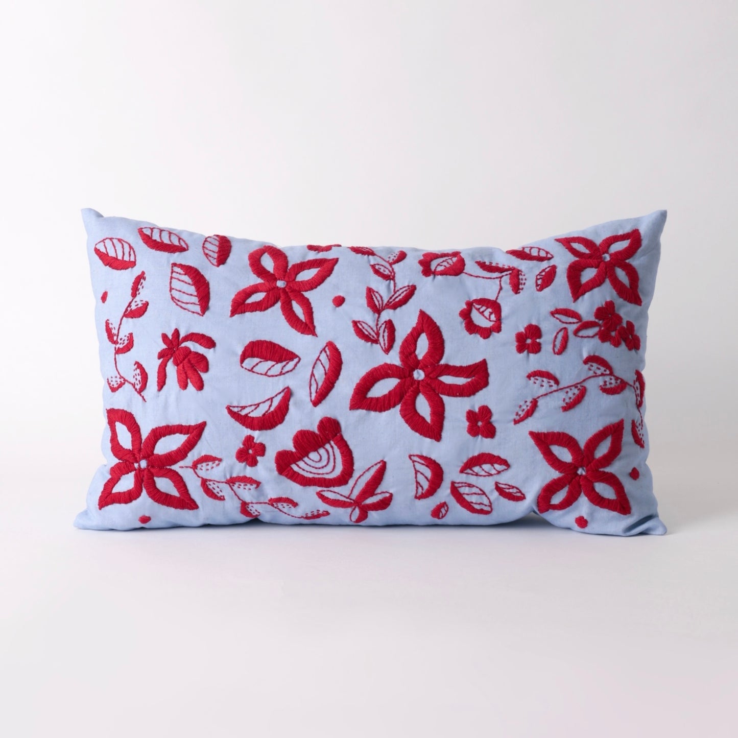 Light blue hand embroidered cushion