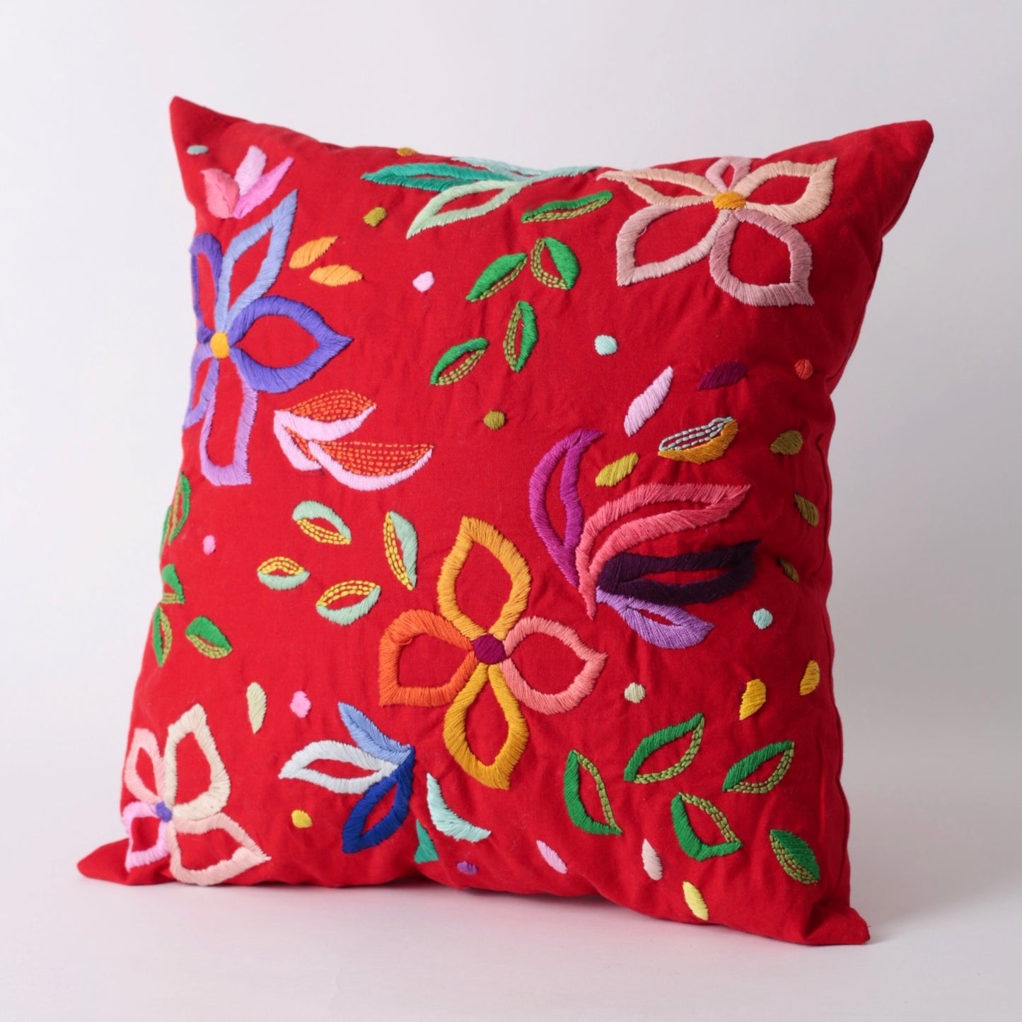 Red hand embroidered cushion