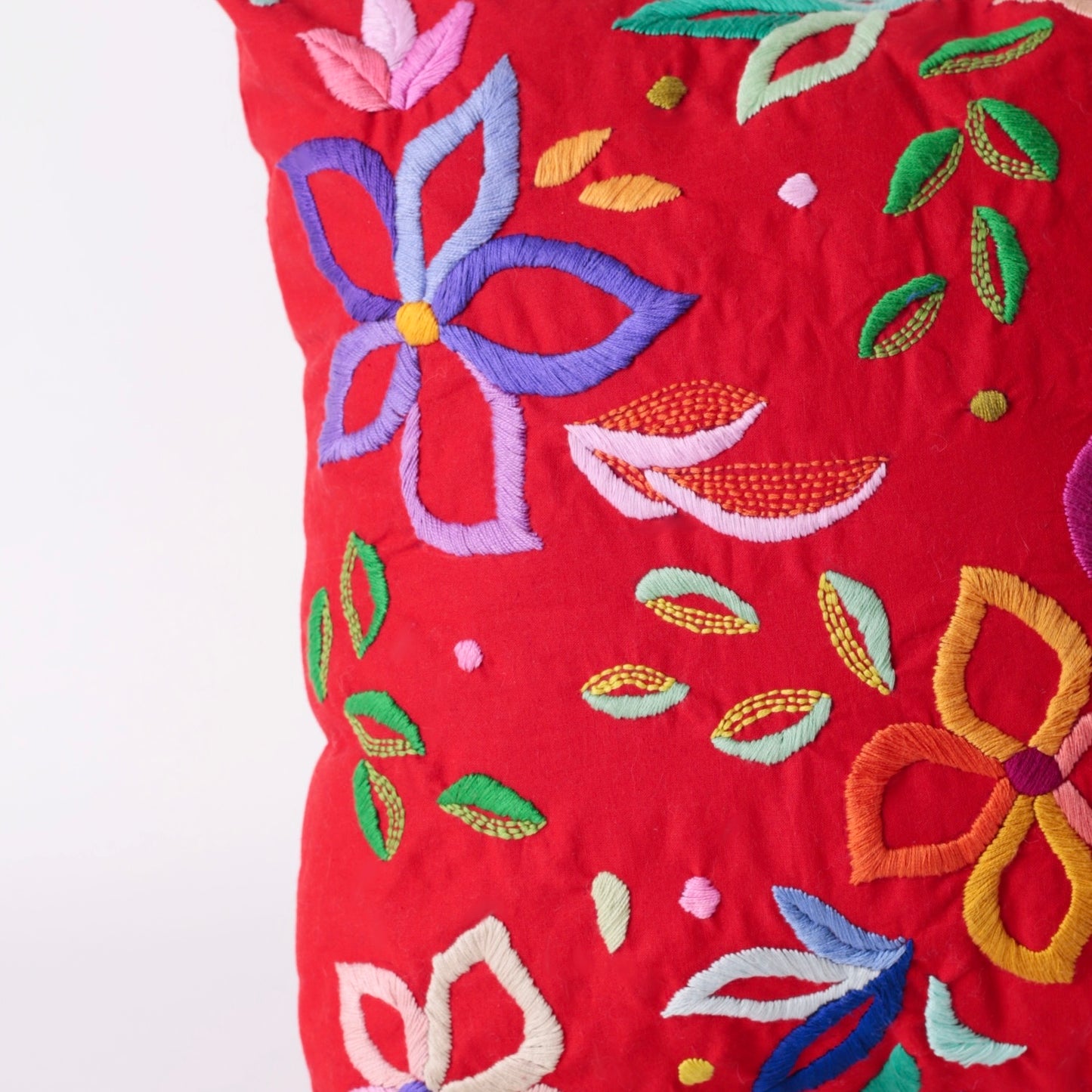 Red hand embroidered cushion