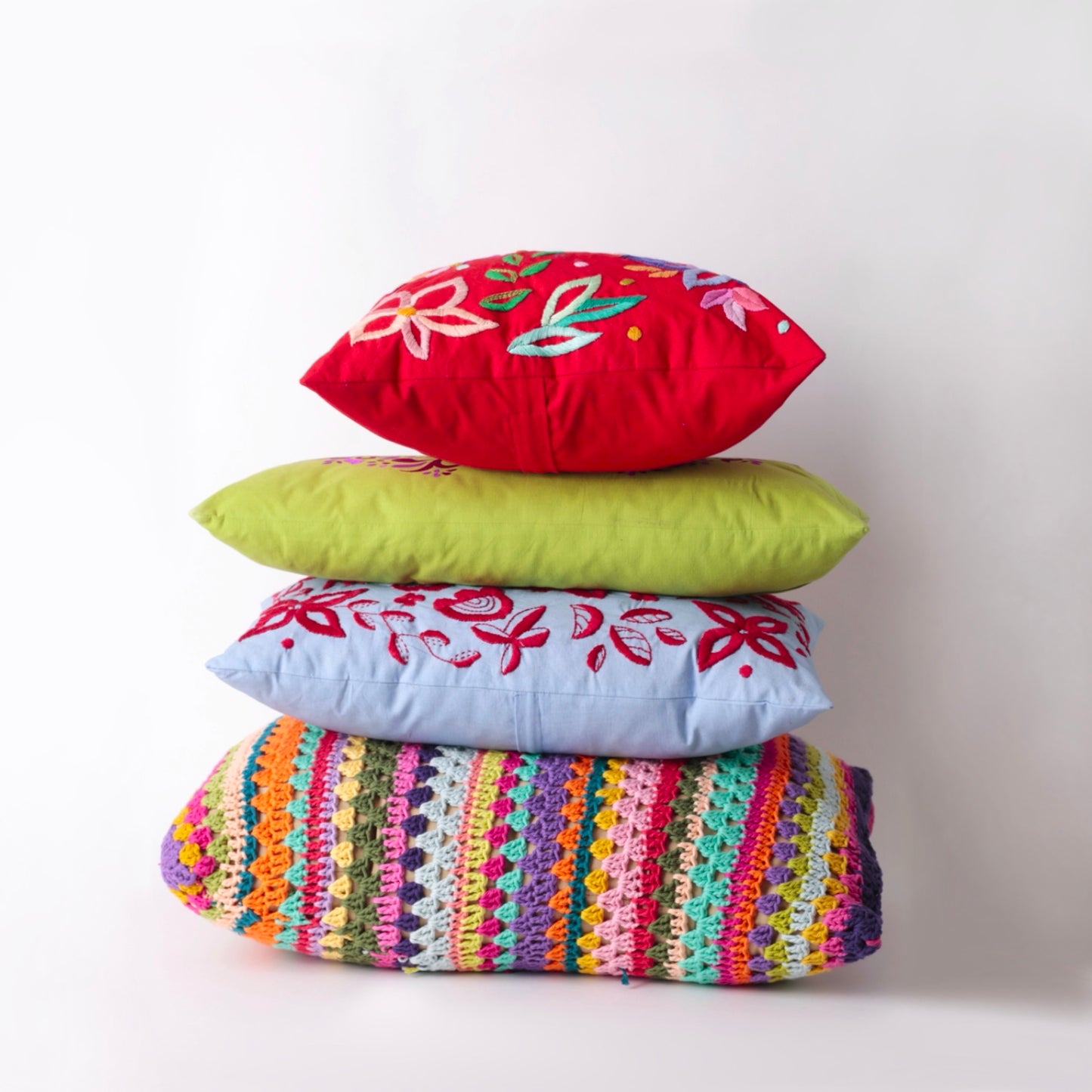 Red hand embroidered cushion